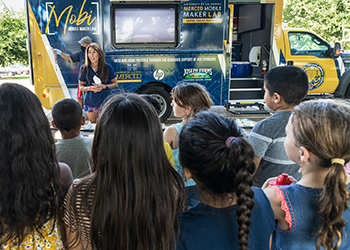 UC Merced's Mobile Maker Lab, aka Mobi, is used by faculty and students to bring STEM-related activities and experiments to schools and the community.